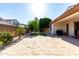 Spacious backyard featuring tiled patio and artificial turf area at 919 W Yellowstone Way, Chandler, AZ 85248