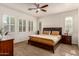 Bedroom with neutral carpet and plantation shutters letting in natural light at 919 W Yellowstone Way, Chandler, AZ 85248