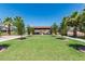 Well-maintained community green space with gazebo, walking path and surrounding palm trees at 919 W Yellowstone Way, Chandler, AZ 85248