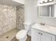 This bathroom has new features including a shower and vanity at 920 E Garnet Ave, Mesa, AZ 85204
