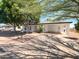 This home features a well-maintained front yard and covered parking at 920 E Garnet Ave, Mesa, AZ 85204