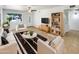 The living room features stylish furniture, natural light, and tile floors at 920 E Garnet Ave, Mesa, AZ 85204