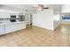 Open concept with tile floors, an eat-in kitchen, and lots of natural light at 920 E Garnet Ave, Mesa, AZ 85204