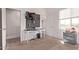 Inviting bedroom with white walls, modern desk, and bright natural light at 932 W Capulin Trl, San Tan Valley, AZ 85140