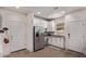 Well-equipped kitchen featuring modern appliances, ample cabinet space, and easy access to the rest of the home at 932 W Capulin Trl, San Tan Valley, AZ 85140