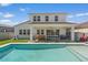 Home exterior with a pool, artificial turf and outdoor seating at 10144 E Toledo Ave, Mesa, AZ 85212