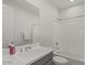 Modern bathroom featuring a stylish vanity with a clean countertop, and a walk-in shower with white tile at 10144 E Toledo Ave, Mesa, AZ 85212