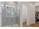 Modern bathroom featuring tiled shower with glass door, offering a clean and stylish design at 10144 E Toledo Ave, Mesa, AZ 85212