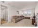 Comfortable living area with neutral tones, plush seating, and plenty of natural light at 10144 E Toledo Ave, Mesa, AZ 85212