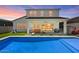 Stunning backyard view with a refreshing pool and covered patio for relaxing evenings at 10144 E Toledo Ave, Mesa, AZ 85212