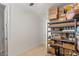 Spacious storage room featuring metal shelving units, and ample storage space for boxes and other belongings at 10144 E Toledo Ave, Mesa, AZ 85212