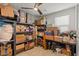 Organized storage room with ample shelving, boxes, and containers for efficient storage solutions at 10144 E Toledo Ave, Mesa, AZ 85212