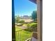 Balcony view overlooking a scenic golf course and desert landscape, providing serene outdoor living at 10229 N 12Th Ct # 1, Phoenix, AZ 85020