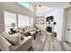Bright living room with vaulted ceiling, fireplace, and stylish furnishings at 10229 N 12Th Ct # 1, Phoenix, AZ 85020