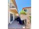 Private patio with brick pavers offers outdoor living space and balcony overhead at 10229 N 12Th Ct # 1, Phoenix, AZ 85020