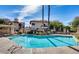 Inviting community swimming pool with lounge chairs and meticulously kept grounds at 10229 N 12Th Ct # 1, Phoenix, AZ 85020