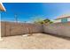 Gravel backyard featuring a block wall for privacy and security of the home at 1029 E Mckinley St, Phoenix, AZ 85006