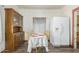 Cozy dining room with a full table setting, adjacent to a large refrigerator at 1029 E Mckinley St, Phoenix, AZ 85006
