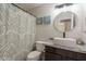 Stylish bathroom with granite vanity, modern vessel sink, and shower-tub combo at 10346 E Desert Dawn Dr, Gold Canyon, AZ 85118