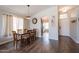 Dining room featuring hardwood floors, natural lighting, and an open concept design at 10346 E Desert Dawn Dr, Gold Canyon, AZ 85118