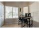 Charming kitchen nook with breakfast bar and seating for two, brightened by natural light at 10346 E Desert Dawn Dr, Gold Canyon, AZ 85118