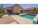 Backyard featuring a refreshing pool surrounded by a patio, ideal for outdoor entertaining at 10346 E Desert Dawn Dr, Gold Canyon, AZ 85118