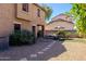 Inviting backyard with gravel, stepping stones leading to an outdoor seating area at 1145 E Lowell Ave, Gilbert, AZ 85295