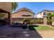 Cozy backyard patio with outdoor seating and a small grassy area at 1145 E Lowell Ave, Gilbert, AZ 85295