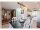 Dining space with views of the living area and updated kitchen, creating a welcoming atmosphere at 1145 E Lowell Ave, Gilbert, AZ 85295