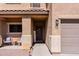 Inviting front porch with a cozy seating area and stylish decor, enhancing the curb appeal of the home at 1145 E Lowell Ave, Gilbert, AZ 85295