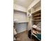 Walk-in closet with shelving for organized storage of clothing and linens at 13300 E Via Linda Dr # 1058, Scottsdale, AZ 85259