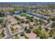 Beautiful aerial view of a home in a desirable neighborhood, close to a community lake and lush landscaping at 1470 W Bartlett Way, Chandler, AZ 85248