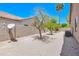 Low maintenance backyard with decorative rock landscaping, perfect for outdoor living and entertaining at 1470 W Bartlett Way, Chandler, AZ 85248