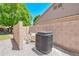 Backyard featuring an A/C Unit, privacy wall and landscaping stone at 1470 W Bartlett Way, Chandler, AZ 85248