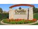 Ocotillo Golf Resort entrance sign surrounded by vibrant flowers and manicured greenery at 1470 W Bartlett Way, Chandler, AZ 85248