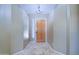 Inviting entryway featuring tile flooring, neutral walls, and a chandelier, offers a warm welcome at 1470 W Bartlett Way, Chandler, AZ 85248