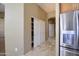Hallway view showing access to rooms and storage closet at 1470 W Bartlett Way, Chandler, AZ 85248