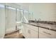 Beautiful bathroom featuring a granite countertop, vanity and a walk-in shower at 15041 W Gray Fox Trl, Surprise, AZ 85387