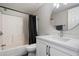 Modern bathroom with shower-tub combo and sleek vanity at 1505 N Center St # 218, Mesa, AZ 85201