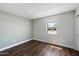Minimalist bedroom with natural light and hardwood floors at 1505 N Center St # 218, Mesa, AZ 85201
