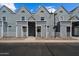 Well-maintained townhouse exterior showing individual unit entrances and tidy landscaping at 1505 N Center St # 218, Mesa, AZ 85201