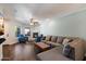 Inviting living room with wood floors, fireplace, and ample seating at 1505 N Center St # 218, Mesa, AZ 85201