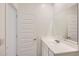 Well-lit bathroom featuring modern fixtures and bright white decor at 16762 W Alameda Rd, Surprise, AZ 85387