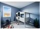 Bedroom featuring a custom bunk bed with a charming camping theme at 16762 W Alameda Rd, Surprise, AZ 85387