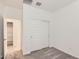 Bedroom featuring sliding closet doors and neutral gray carpet at 16762 W Alameda Rd, Surprise, AZ 85387