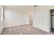 Bedroom featuring soft carpet, large windows, and ample natural light at 16762 W Alameda Rd, Surprise, AZ 85387