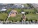 Wide aerial view of community park including baseball fields, soccer fields, playground and nearby school at 16785 W Montana De Oro Dr, Surprise, AZ 85387