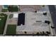 Drone view of the backyard showcasing the putting green, pergola, and solar panels at 16785 W Montana De Oro Dr, Surprise, AZ 85387