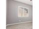 Bedroom featuring tile floors and a window with blinds at 16785 W Montana De Oro Dr, Surprise, AZ 85387
