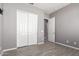 Bedroom featuring closet with bi-fold doors at 16785 W Montana De Oro Dr, Surprise, AZ 85387